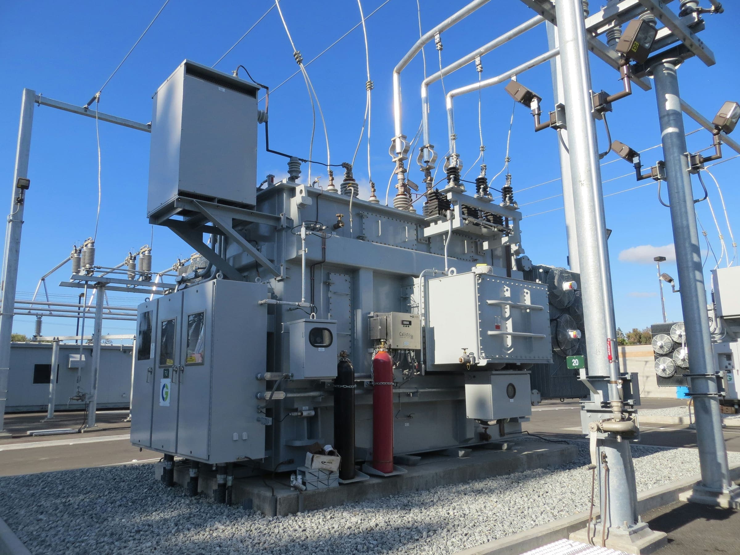 Utility linemen working on an electricity pole